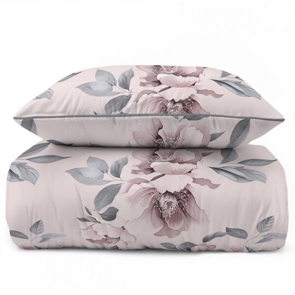 Duvet cover and two pillow cases with a pink floral pattern on a pale pink background.