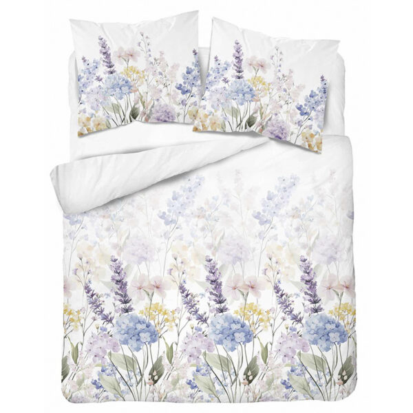 White bed dressed with a pastel floral duvet cover and matching pillow shams featuring lavender and hydrangea blossoms.
