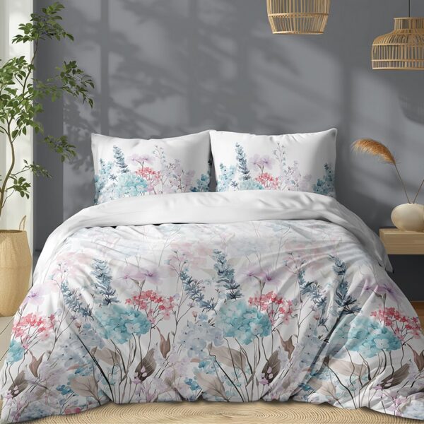 Bed with pastel floral duvet and matching pillows in a sunlit, modern bedroom.