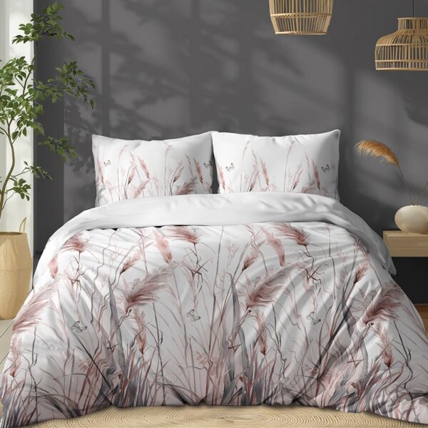 Queen bed with white duvet and pillows featuring pink grass pattern in a bright gray-walled bedroom with a tall plant by the window and woven pendant lights.