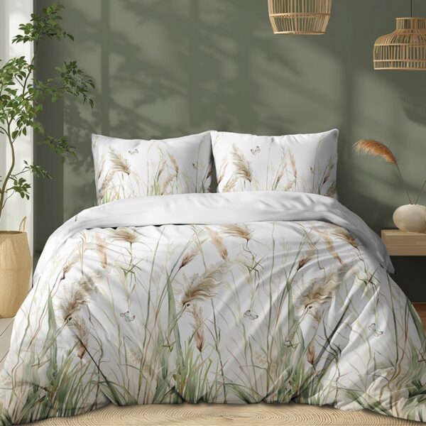 Cozy bedroom with a white duvet featuring tall grass pattern, green wall, and wicker pendant lights in warm natural light.